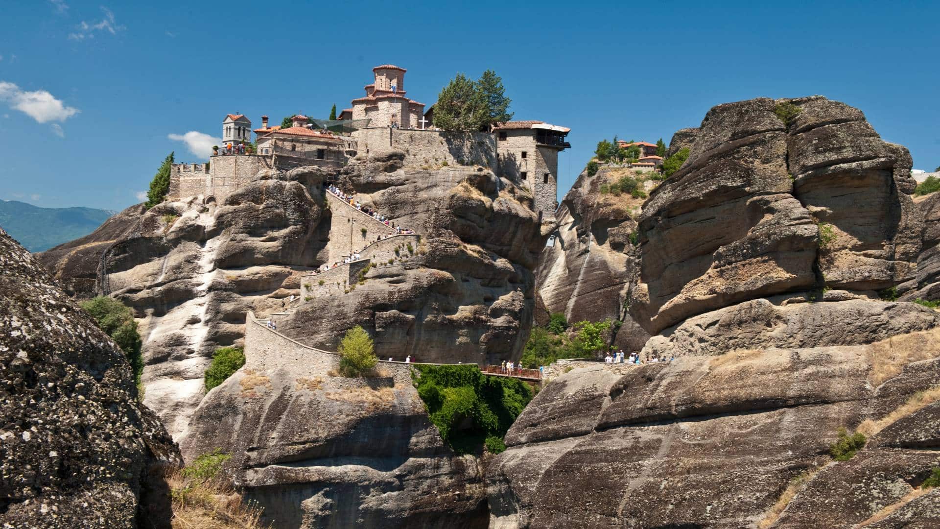 Mainland Greece road trip a scenic view featuring ancient ruins and lush landscapes, representing the diversity of historical and natural attractions